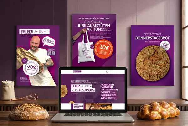 Ein moderner Arbeitsplatz zeigt Werbematerialien der Brotmacher-Werbeagentur zusammen mit einem Laptop. | © madmoses